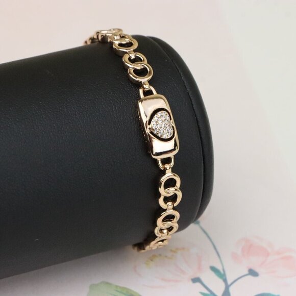 "Elegant Heart Charm Rose Gold Bracelet in High-Polish Finish, XPBL0899 - Picture 1 of 12